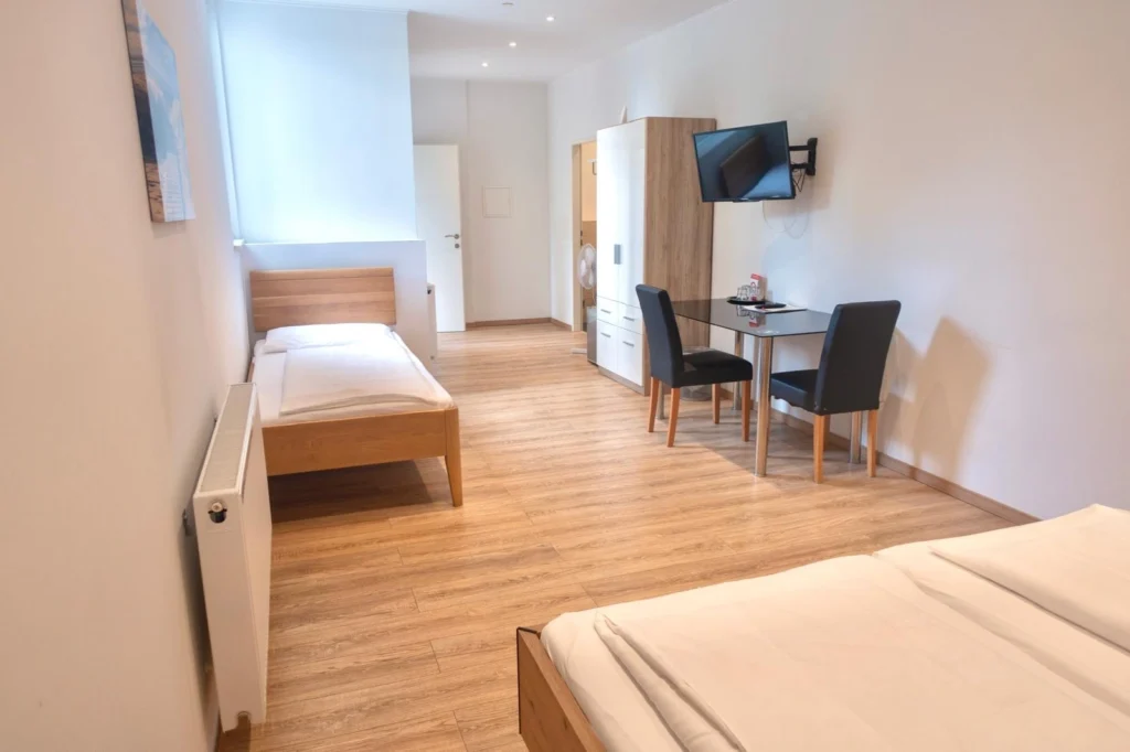 Hössl_Dreibettzimmer_4